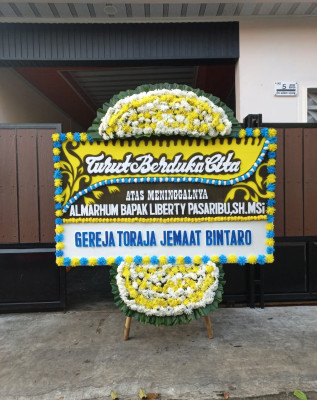 Papan Bunga Duka di Simpang Hulu